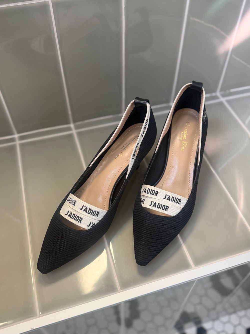 Black Pointed-Toe Heels with White Logo Band